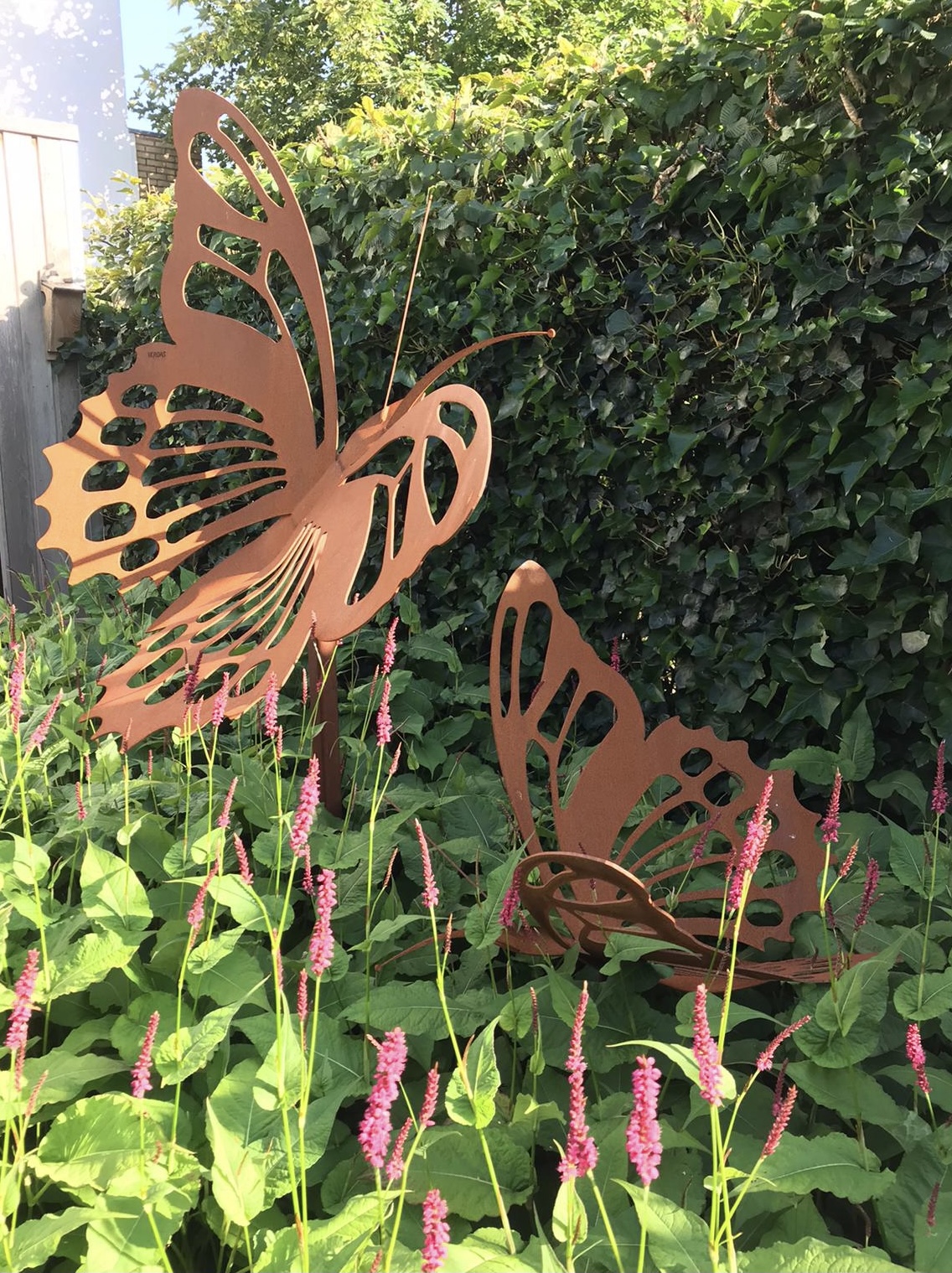 Vinders voor in de tuin van geroest staal